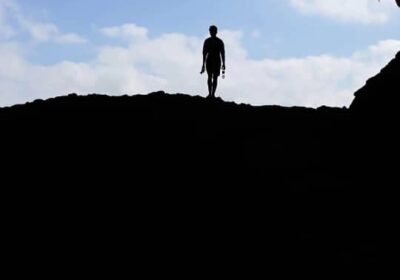 traveler in hoq cave Socotra