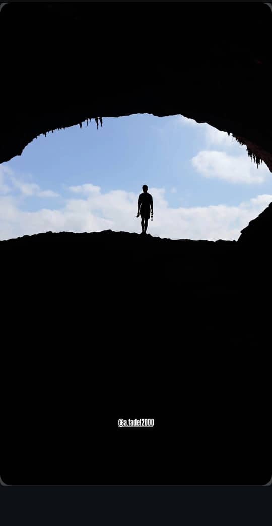 traveler in hoq cave Socotra